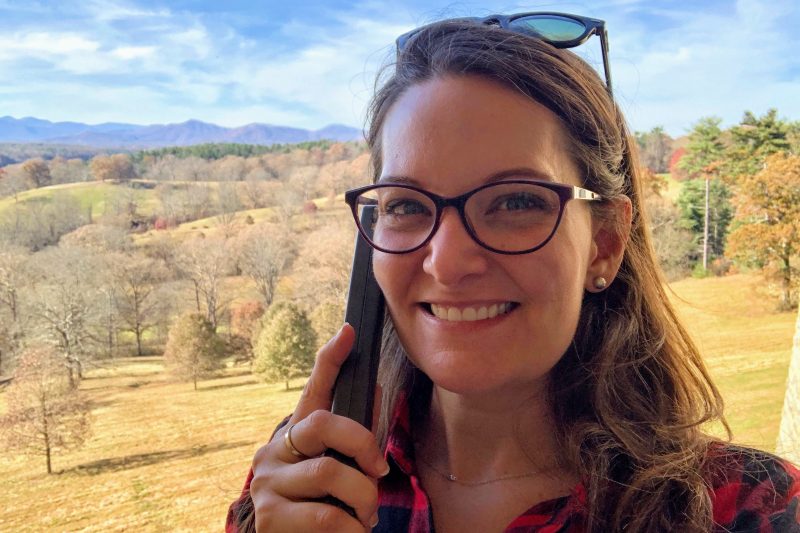 woman on phone starting a blog