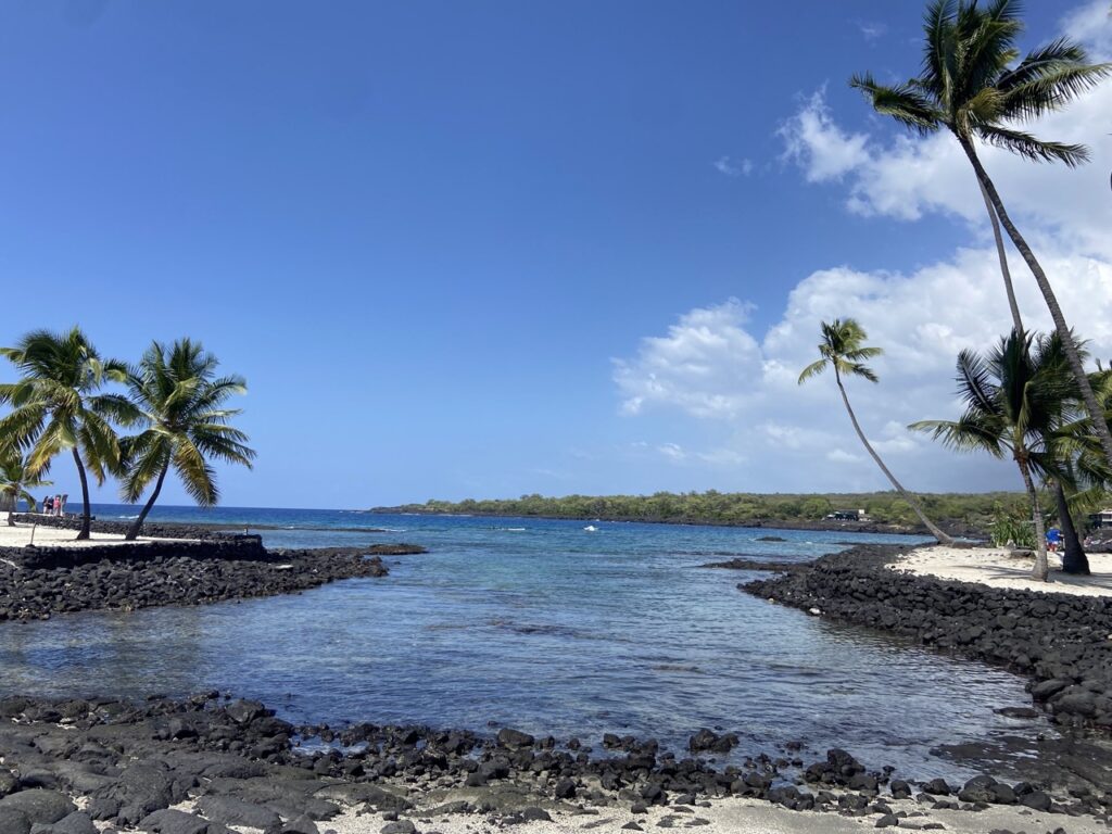 image shows a small lagoon at Puʻuhonua o Hōnaunau national park site on The Big Island of Hawaii