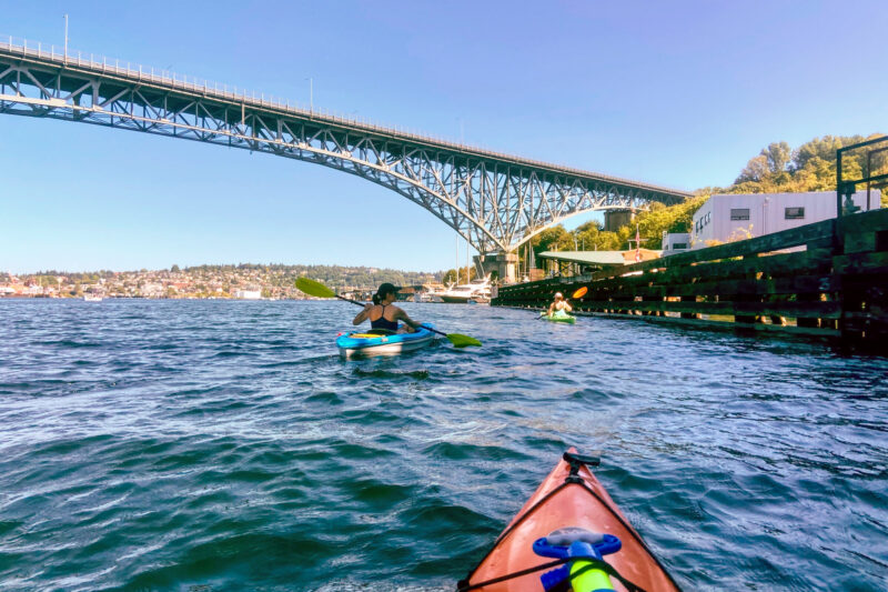 image shows kayaking on Lake Union in Seattle summer