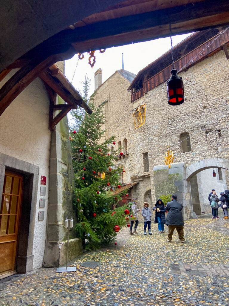 chateau de chillon interior courtyard decorated with a Christmas tree for the holiday