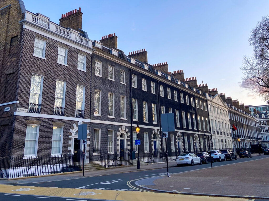 a row of Georgian brownstone townhomes in a row in London