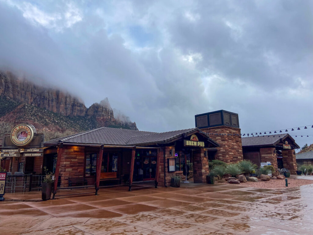 The Springdale Zion Brew Pub restaurant sits against the canyon walls of the park.